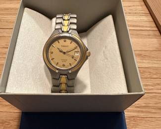 J33 - $75. Tissot T660 Titanium Case. Needs new battery - untested. 