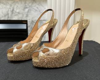C116 - $125. Size 35.5. Christian Louboutin Strassed Sparkle Sling Backs. (We have extra crystals to replace the few that have fallen off)