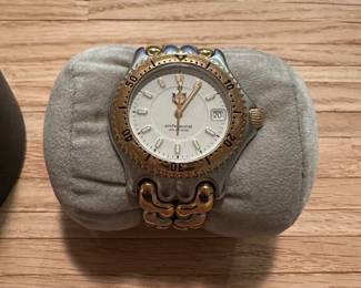 J34 - $175. Mens Tag Heuer Professional 200 meters. Needs new battery - untested. 