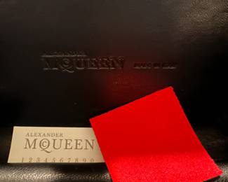C108 - $400. Alexander McQueen Red Satin Clutch. Very gently used. Beautiful Color!