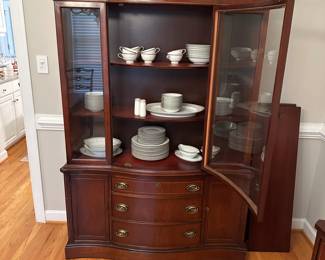 C32 - $250. Bassett Furniture China Cabinet. Measures 49" wide x 14.5" deep x 69" tall. MOVES IN ONE PIECE. 