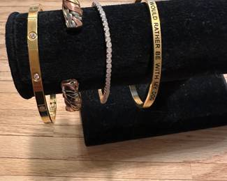 J8 - $15. Set of 4 Fashion Bracelets. 