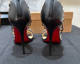 C124 - $175. Size 35.5. Christian Louboutin Leather Studded Heels with Bag & Box. 
