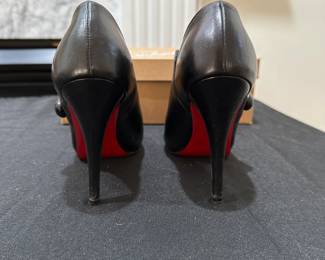 C121 - $225. Christian Louboutin C'est Moi Black Leather Button Ankle Boots with Box. 