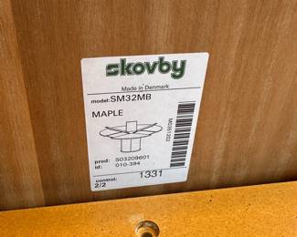 C44 - $650. Skovby Model SM32MB Maple. Made in Denmark. Extending Segmental Pedestal Dining Table. Table measures 47" round x 28.5" tall. With Pop Up leaves it is 57" wide. Chairs need cleaned or reupholstered.  Table shows signs of wear. By turning the turntable under the tabletop the three leaves move synchronously to a position that makes room for the extension leaves in the base. When light pressure is applied the extension leaves unfold by means of a spring placed under the triangle in the middle of the table. 