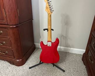 C15 - $100. Squier Mini by Fender with Stand. 