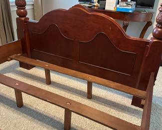 C57 - $200 - Queen 4 Poster Bed Frame.  Measures 66" wide x 93" long x 84" tall. No mattress available. Small cosmetic crack on the right side of the headboard. Still structurally sounds and could easily be covered with a furniture pen. 