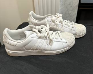 C102 - $10. Mens 9. Adidas Low Top Sneakers. 
