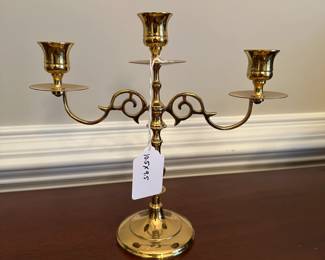 C159 - $15. Brass Candleabra. Measures 10" wide x 9.5" tall. 