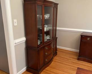 C32 - $250. Bassett Furniture China Cabinet. Measures 49" wide x 14.5" deep x 69" tall. MOVES IN ONE PIECE. 