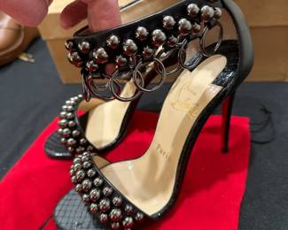 C124 - $175. Size 35.5. Christian Louboutin Leather Studded Heels with Bag & Box. 