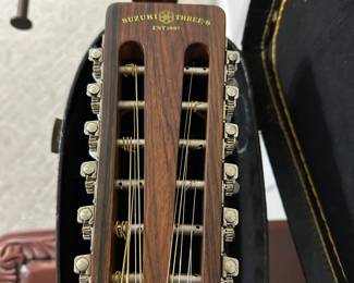 C19 - $175. Vintage Suzuki Guitar No F180-12 with Hard Case. 