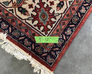 C129 - $250. 9' x 12' Area Rug. No Tag. Appears to have some sun fading - beautiful colors. 