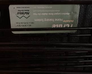 C148 - $35 - Large Metal Folding Dog Kennel. Measures 48" x 30" x 33". 