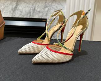 C118 - $175. Size 35. Christian Louboutin Cross Blake Pumps. Excellent Condition. 