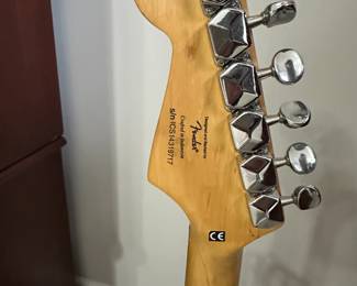C15 - $100. Squier Mini by Fender with Stand. 