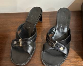 C127 - $75. Size 5.5. Chanel Shoes with Bag & Box. Black Mules. Bottoms are worn. 