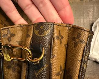 C105 - $1450. Louis Vuitton Pochette Metis Monogram Reverse. With Box and Authenticity Certificate. Has minor cracking and scratches on the metal. If you would like to see prior to committing please let me know when you reach out. 