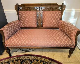 Stick and ball era loveseat