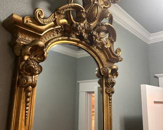 FRENCH GILTWOOD PIER MIRROR WITH IMPRESSIVE CARVED PEDIMENT, TERMINAINTING INTO A MARBLE PLATEAU - STUNNING