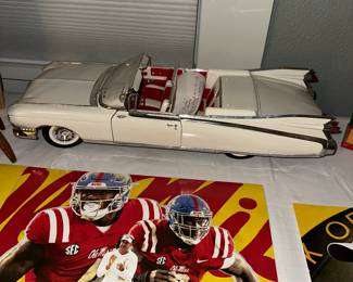 REBEL POSTERS AND VINTAGE CAR