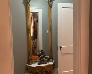 FRENCH GILTWOOD PIER MIRROR WITH IMPRESSIVE CARVED PEDIMENT, TERMINAINTING INTO A MARBLE PLATEAU - STUNNING