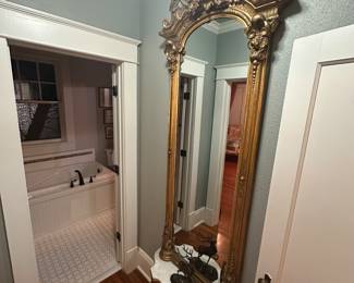 FRENCH GILTWOOD PIER MIRROR WITH IMPRESSIVE CARVED PEDIMENT, TERMINAINTING INTO A MARBLE PLATEAU - STUNNING