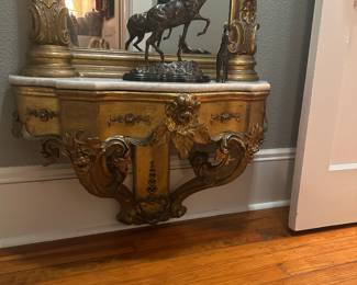 FRENCH GILTWOOD PIER MIRROR WITH IMPRESSIVE CARVED PEDIMENT, TERMINAINTING INTO A MARBLE PLATEAU - STUNNING