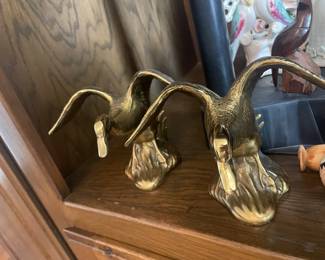 A pair of Vintage Brass bookends Ducks landing 