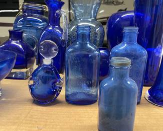 Antique cobalt blue glass bottles and more