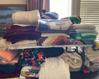 Large selection of hand, stitched and crocheted, quilts, and blankets