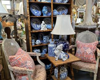 Pair of painted carved Louis XVI fauteuils; 19c English burnt bamboo bookcase filled with blue and white pottery, 19c. burnt bamboo side table, and more