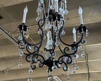 Wrought iron, Eight-light chandelier adorned with strands of tear-drop crystals