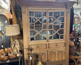 Cabinet with fretwork doors.