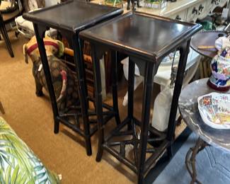 Pair of painted rattan pedetal tables with fretwork stretchers