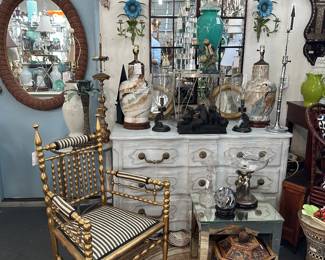 19th Century giltwood bobbin-turned amrchair; Painted Italian commode; Mirrored accent table; Pair of Italian glazed pottery lamps; Arched window pane mirror; and more