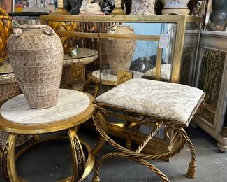 Gilded Iron rope-and-tassel stool by Niccolini; Mirrored credenza, Giltwood Chinese drum table with round marble top, and more
