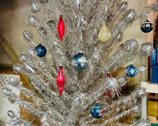 4 1/2' Tinsel Tree with original box and original sleeves 

** PLEASE NO PRICE INQUIRES 