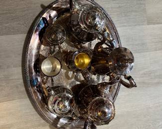 #53A - $150 - 10 piece sliver plated tea set - 3 tea pots - 1 tray - 2 creamers - 2 sugars