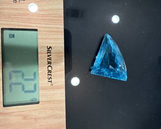 #74 - $600 - 110 carat special cut blue Topaz