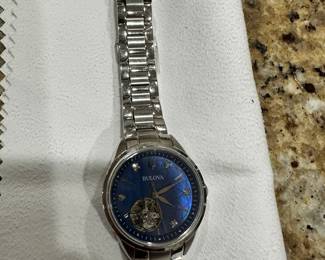 #67 - $100 - Bulova men watch model C8601398-23710204 - water resistant - Japan stainless steel. 
