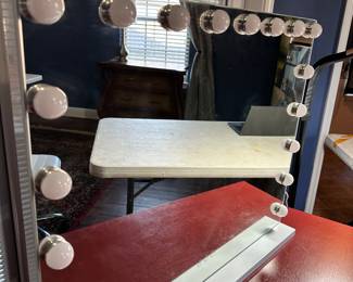#59 - $50 - Touch screen make up mirror 23x27

