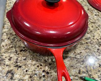 #63 - $125 - Le creuset iron coated size 27 - deep pot with lid 

