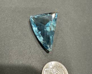 #74 - $600 - 110 carat special cut blue Topaz