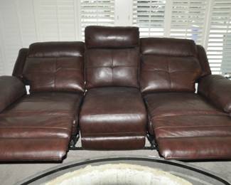 Open View of the Brown Leather Couch with Power Reclining Ends.