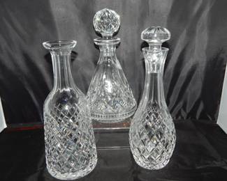 More Wonderful Waterford Including a 11.25"H "Comeragh" Cordial Decanter with Stopper, a Lismore Roly Poly 10.5" Decanter with Stopper and an "Alana" Decanter.