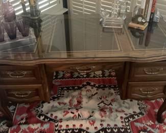 Great Detail of the Sligh Furniture (Holland, Michigan) Walnut Wood "Lowry Desk", Five-Drawers, Gold Tooled Leather Top and Custom Glass Top, 56"W x 29"D x 28"H.