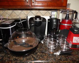 Excellent Selection of Kitchen Appliances Available Including a 7 Cup Red Kitchen Aid Food Processor, Red Cuisinart "Easy Pop" Hot Air Popcorn Maker and More.