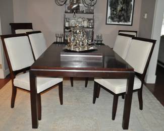 Up Close View of the Beautiful Mahogany Henredon Dining Table Designed ByJimmy Hayes, 69"W x 44.75 x 29.75"with Two Additional Leaves Measuring 20"W and 6 Dining Chairs.