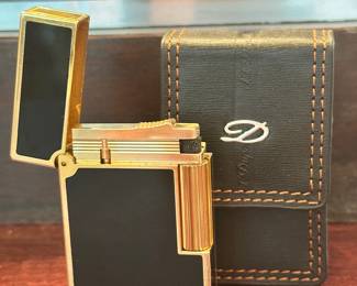 Fabulous French Gold S.T Dupont Ligne Refillable Lighter with Black Lacquer detailing.